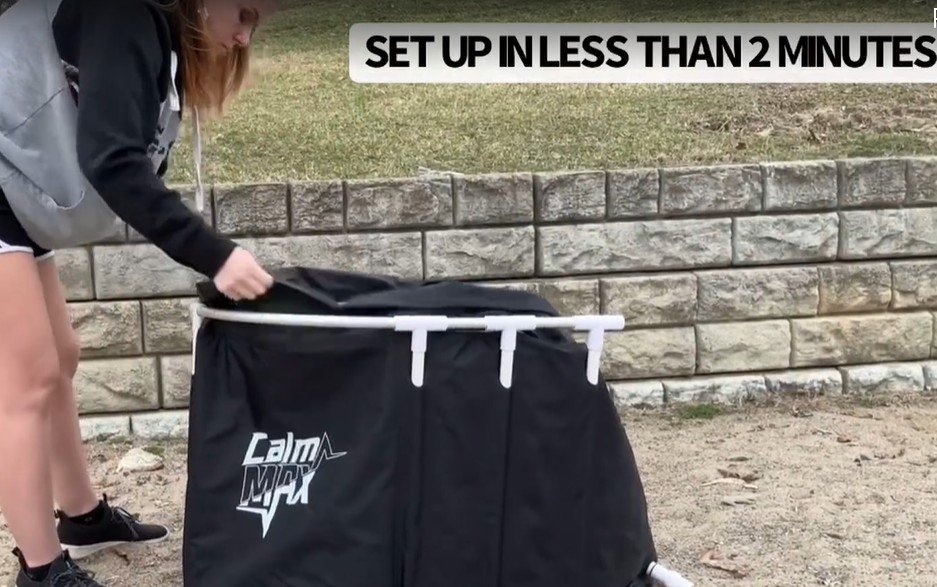 woman putting up CalmMax Portable Ice Bath Tub