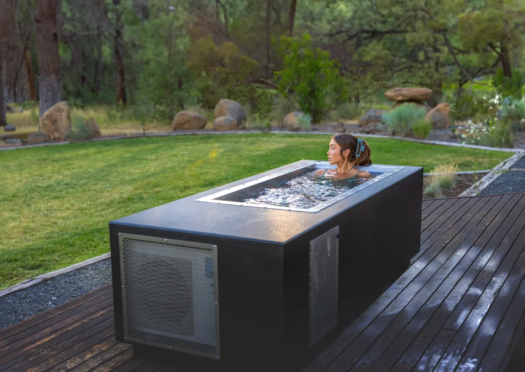 a woman in a bluecube plunge